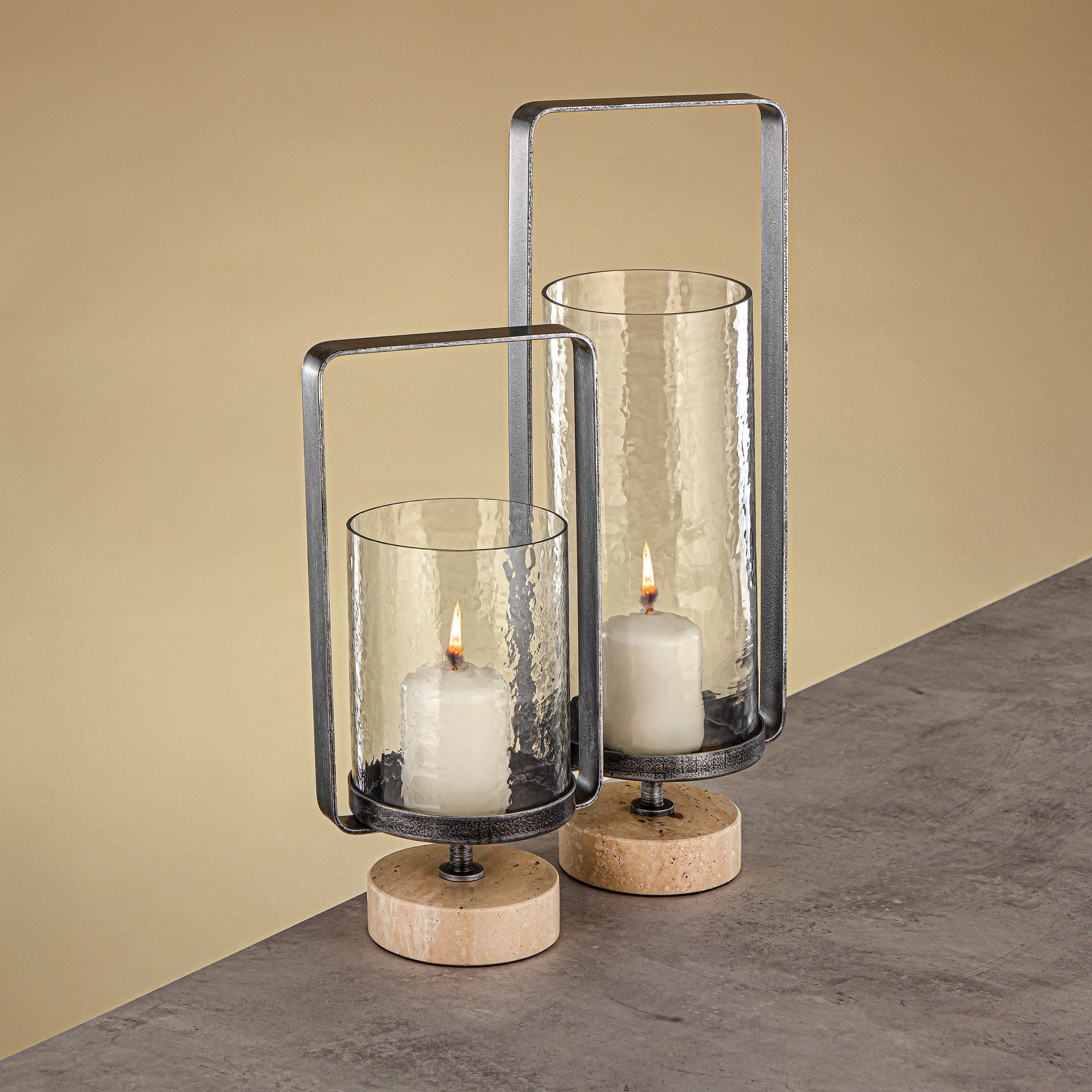 Almarjan Kalon Hurricane Lantern Hammered Clear Glass 15.5x12.5x32.5 CM Brushed Grey & Travertine Base (GMT2960026)