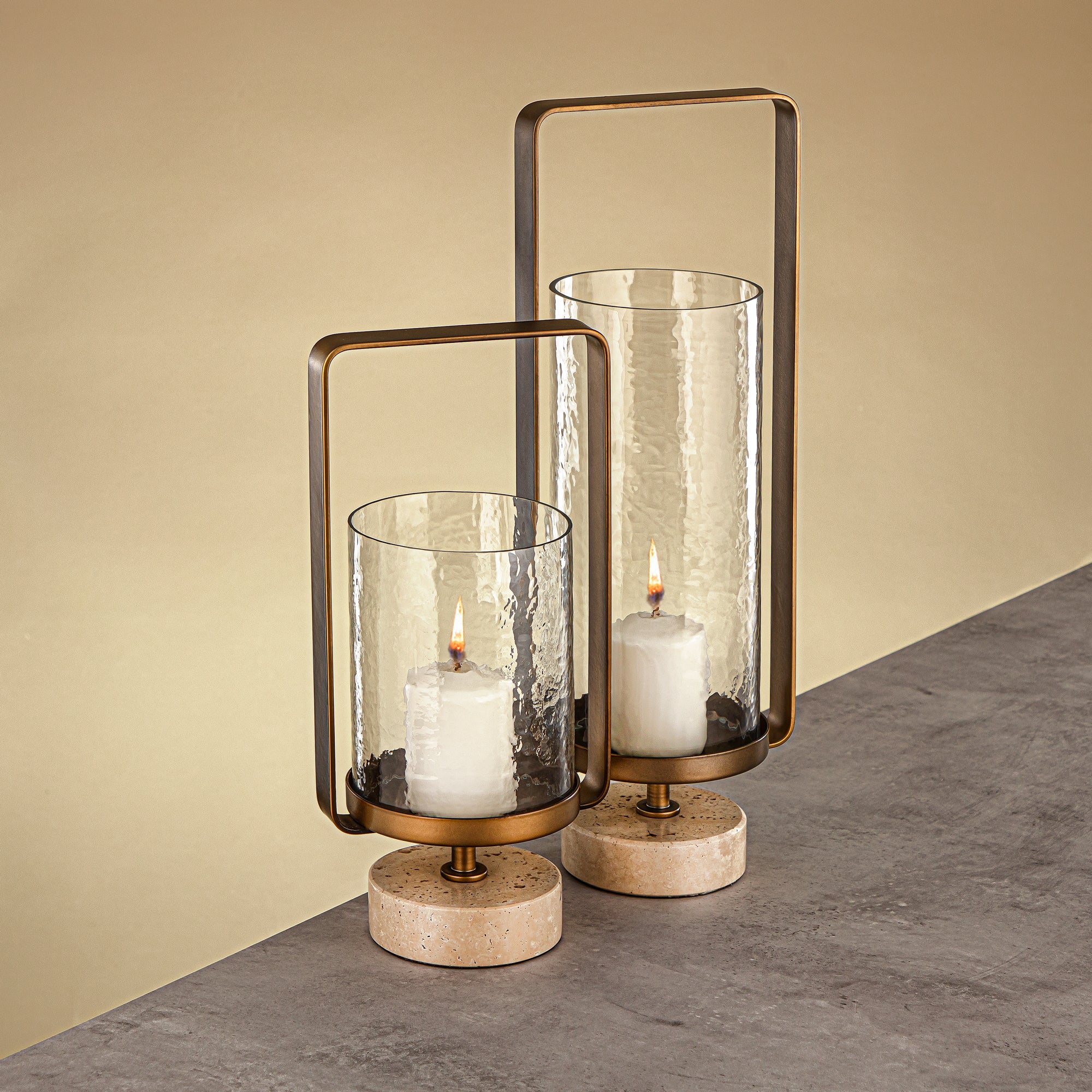 Almarjan Kalon Hurricane Lantern Hammered Clear Glass 16x10.5x43.5 CM Brushed Gold & Travertine Base (GMT2960029)